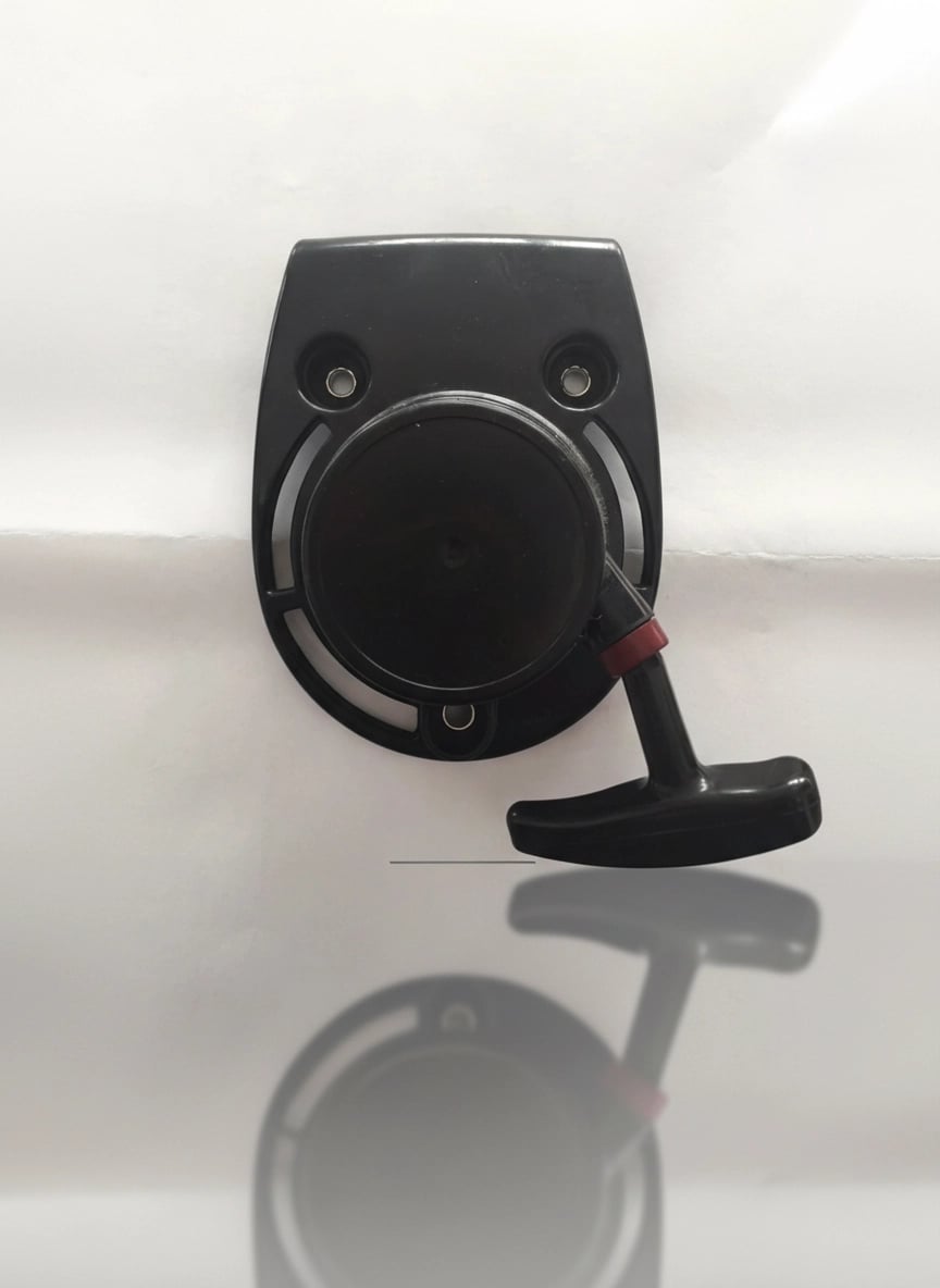 Recoil starter assembly for GX35 engine, showing pull cord and housing.